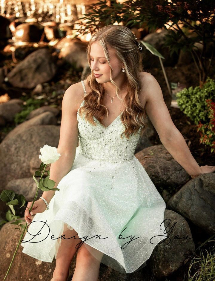 Shimmering mint green party dress with embroidery from Zazabella